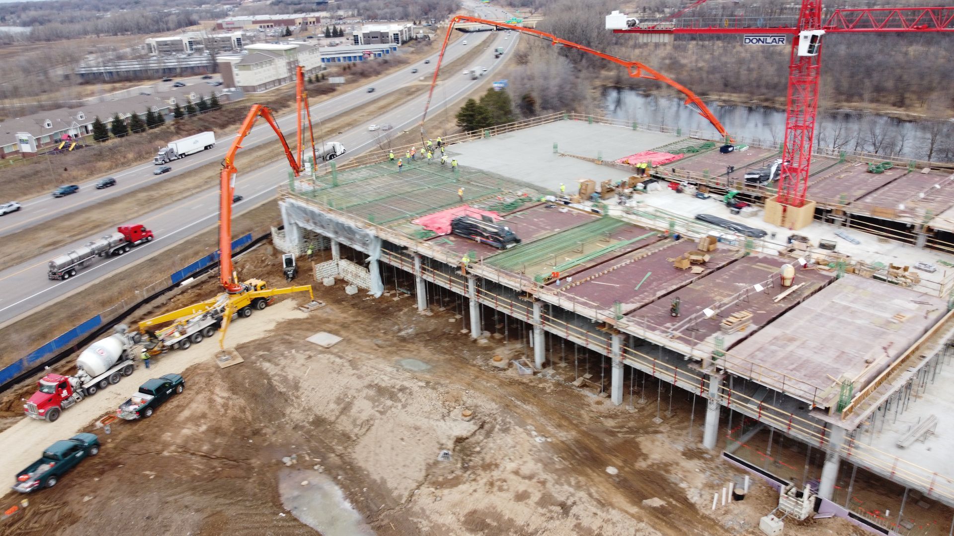 An aerial view of a large building under construction.