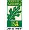 Certified Arborist ISA on green sign with tree logo in corner