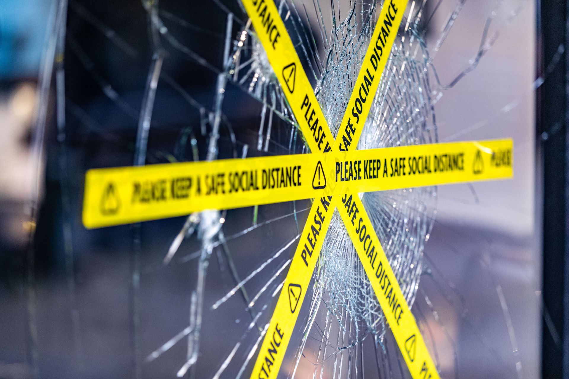 Shattered glass window with yellow