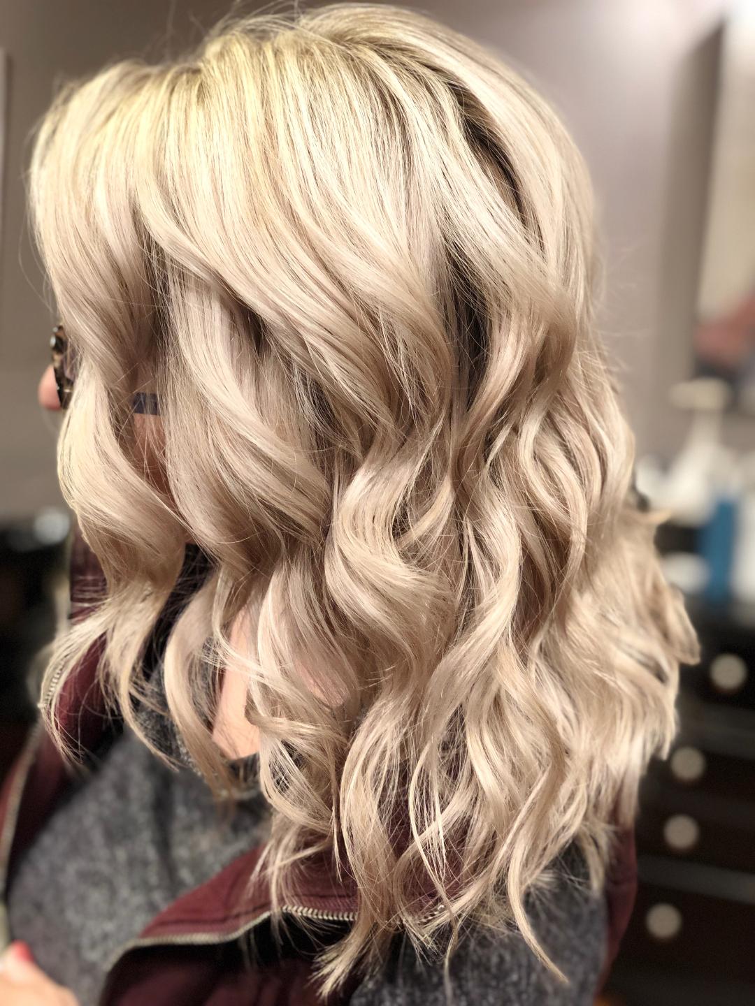 Short curled blonde hair