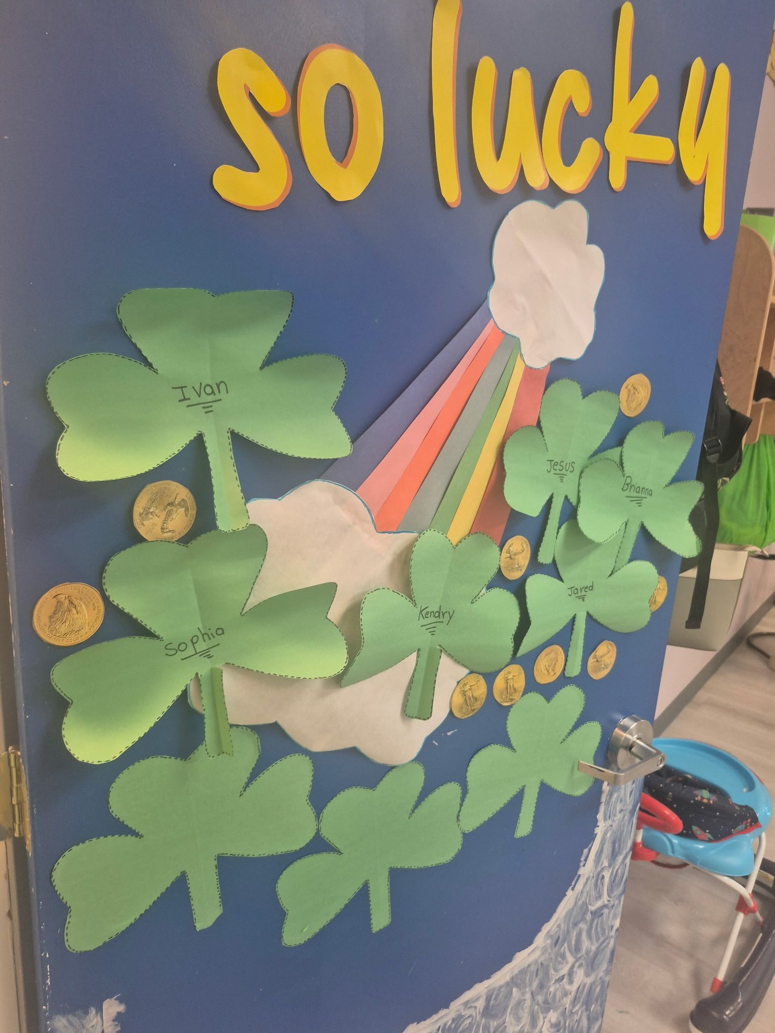 A blue door decorated with yellow 