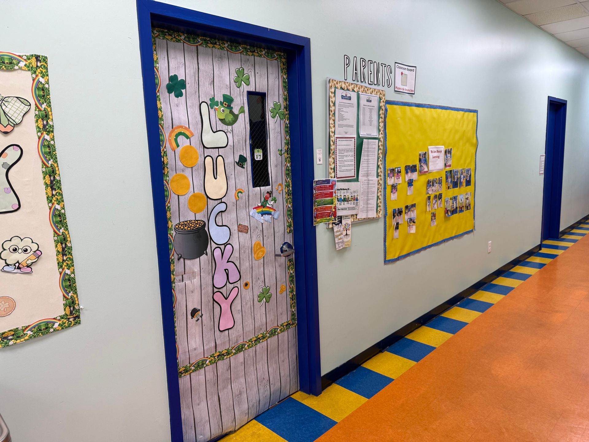 A classroom door decorated with a St. Patrick’s Day 