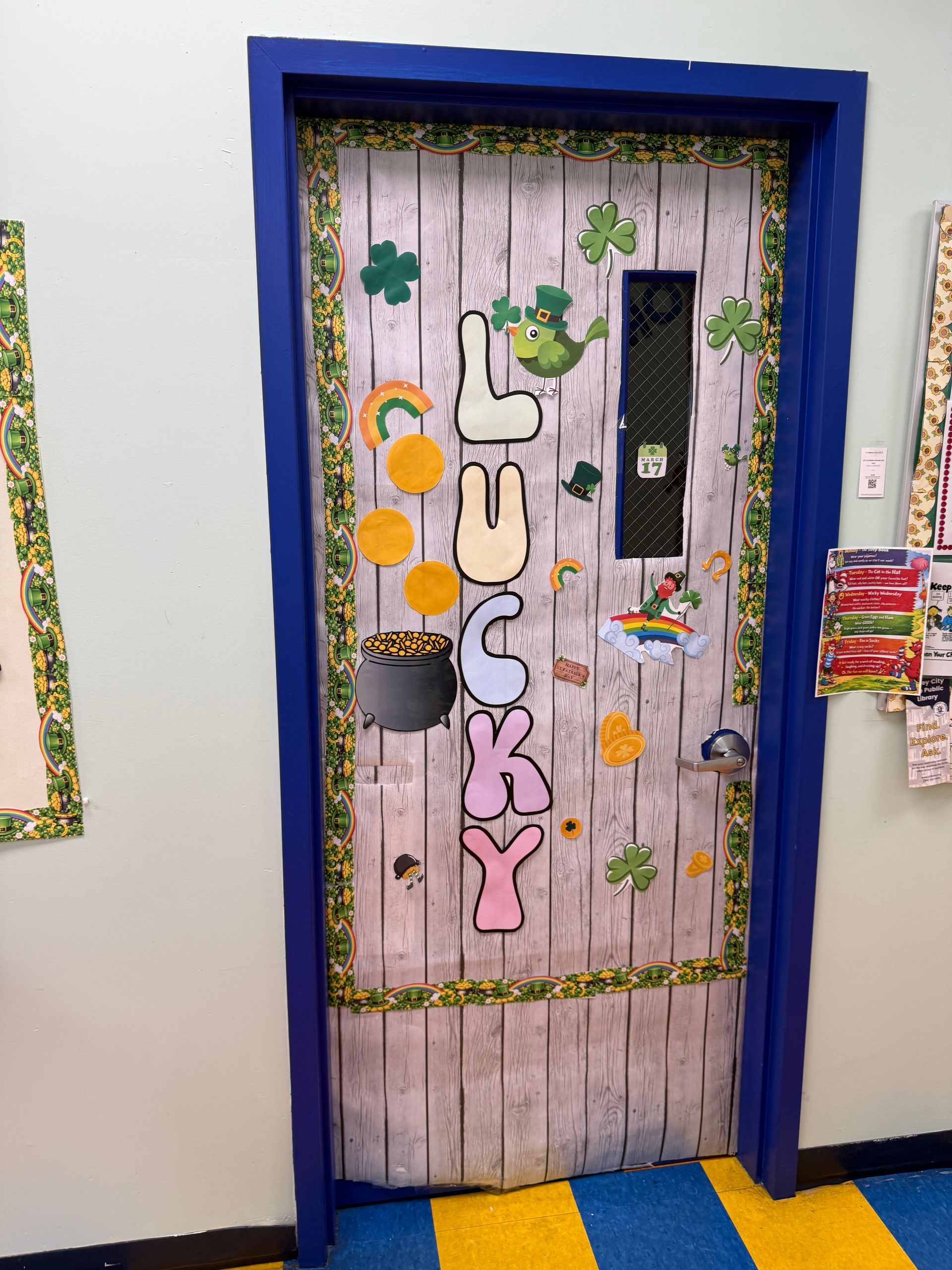 A classroom door decorated for St. Patrick's Day with 