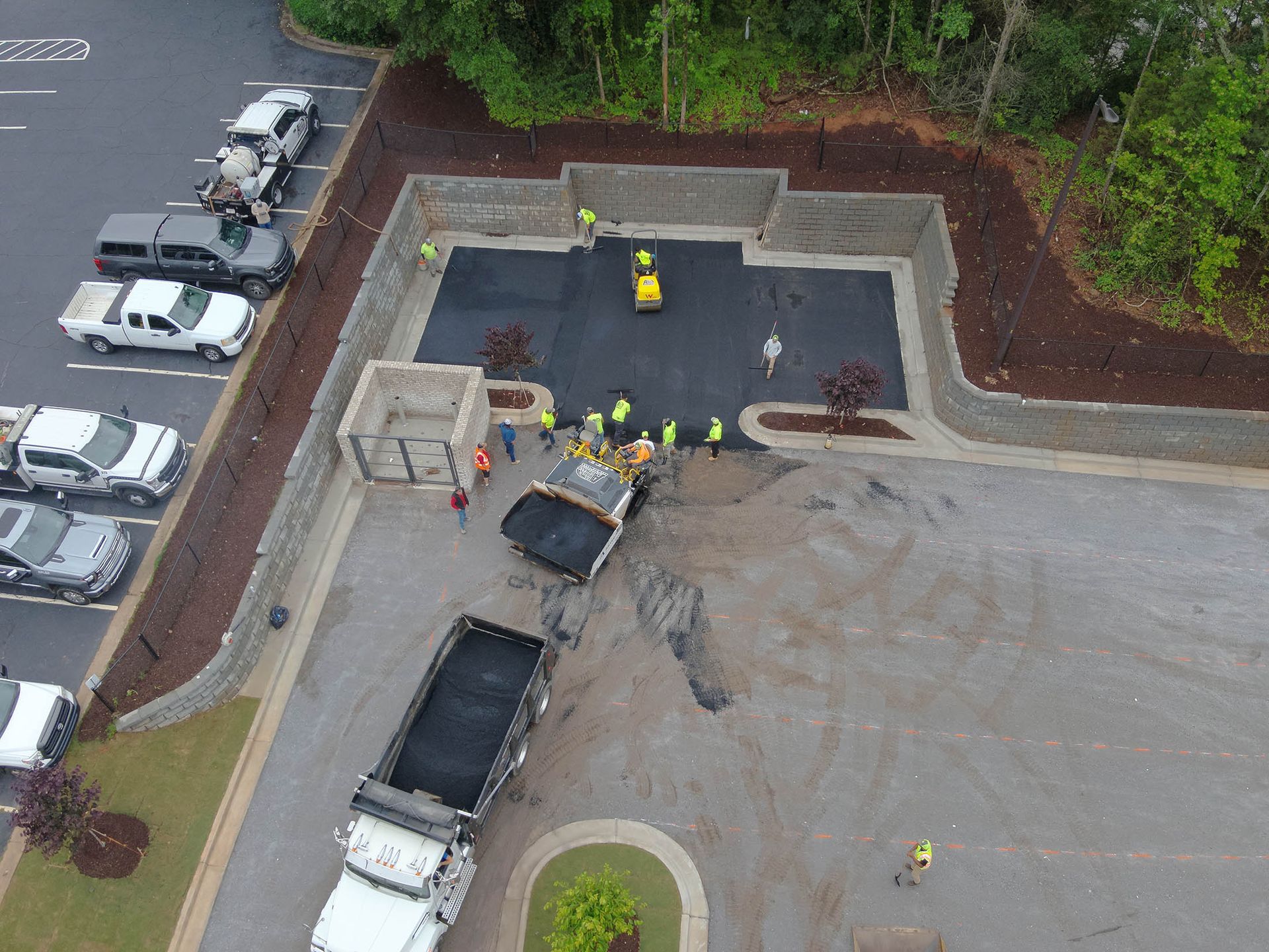 Asphalt paving in progress.