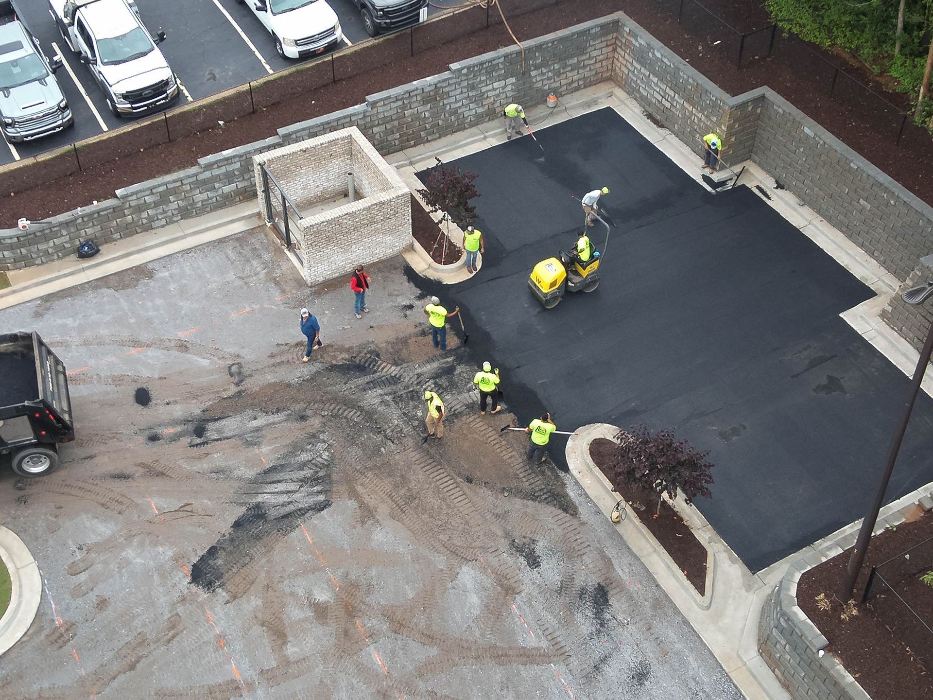 Asphalt paving in progress.