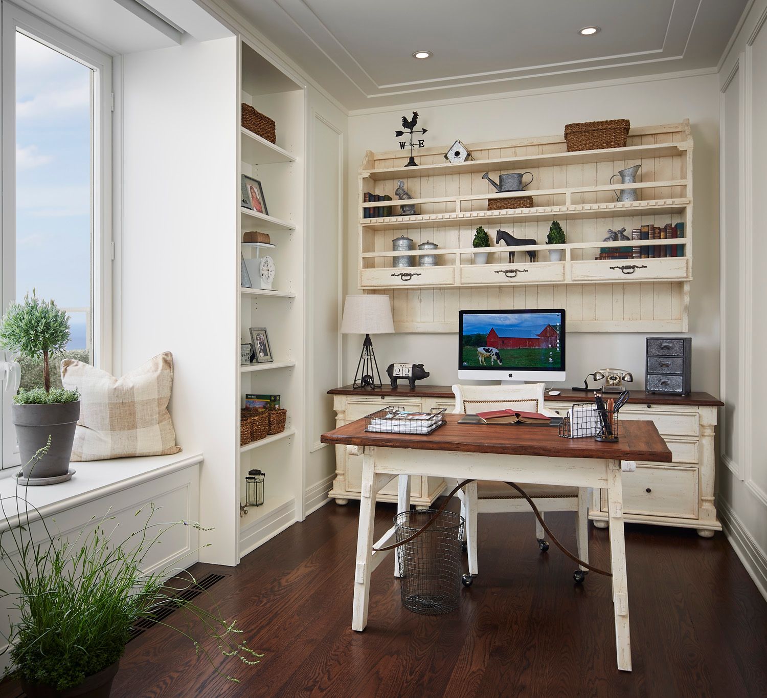 A home office with a desk and a computer on it