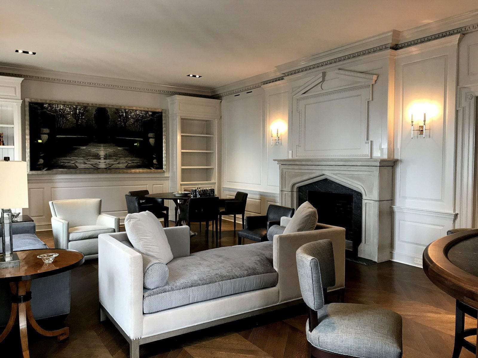 A living room filled with furniture and a fireplace.