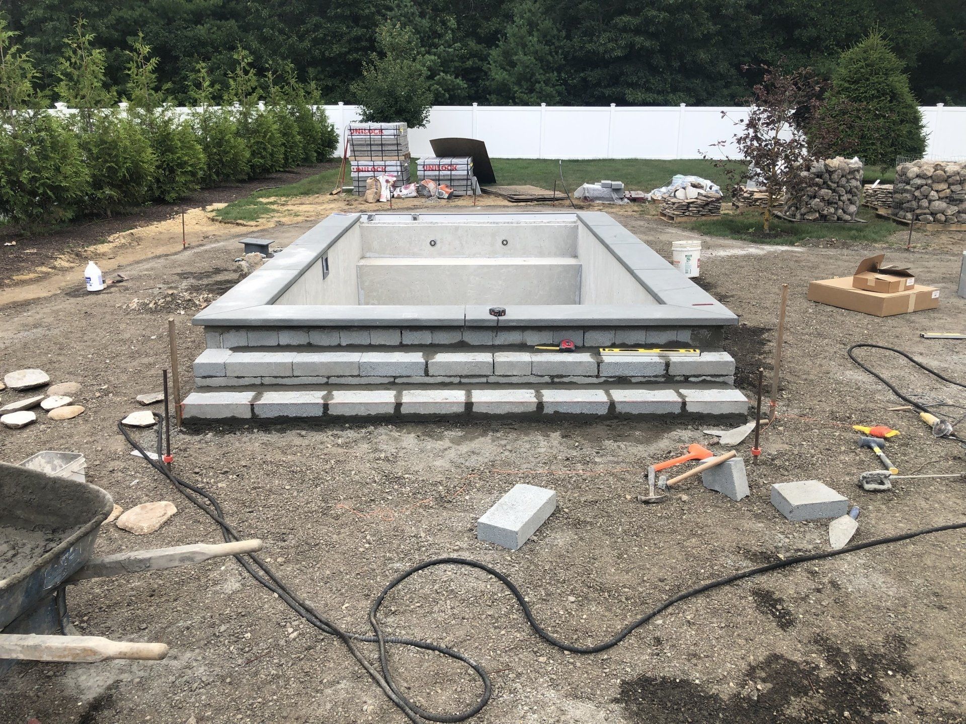 A large swimming pool is being built.