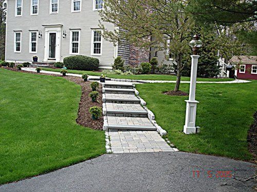 A house with a walkway leading up to it