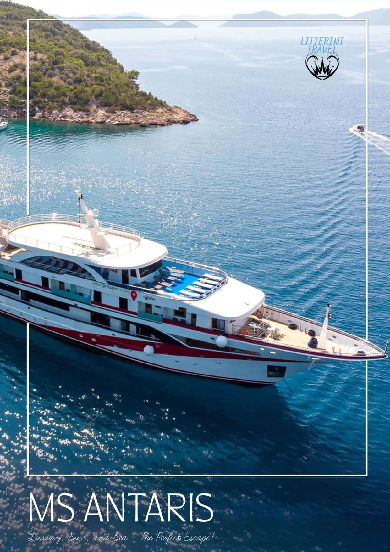 MS Antaris cruise ship in blue water near a green island. The ship has a white top with red stripes.