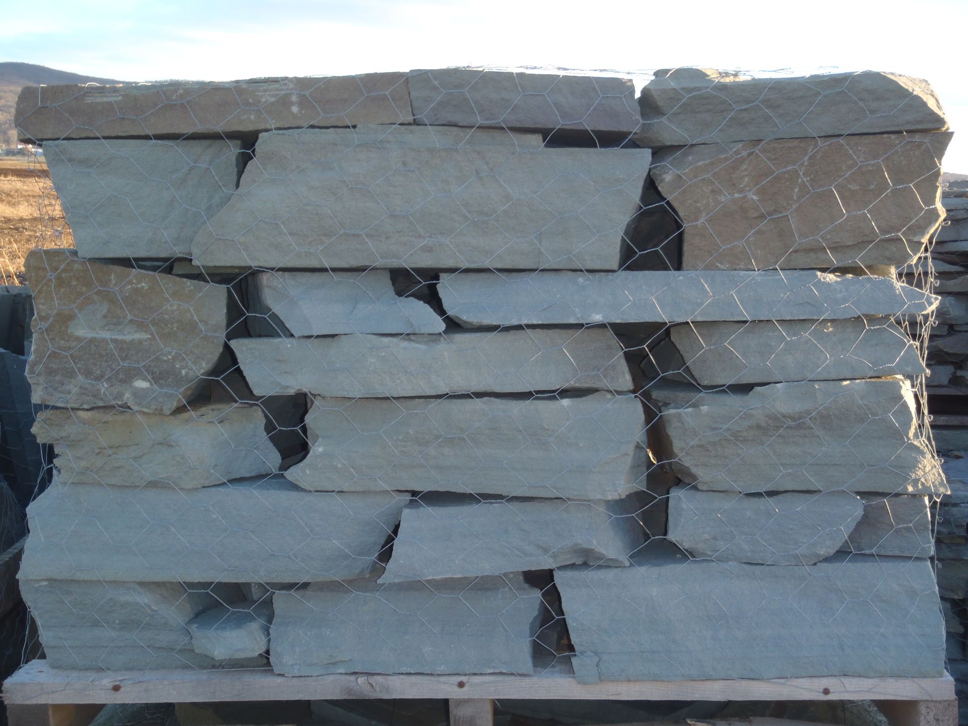 a pile of rocks sitting on top of a wooden pallet