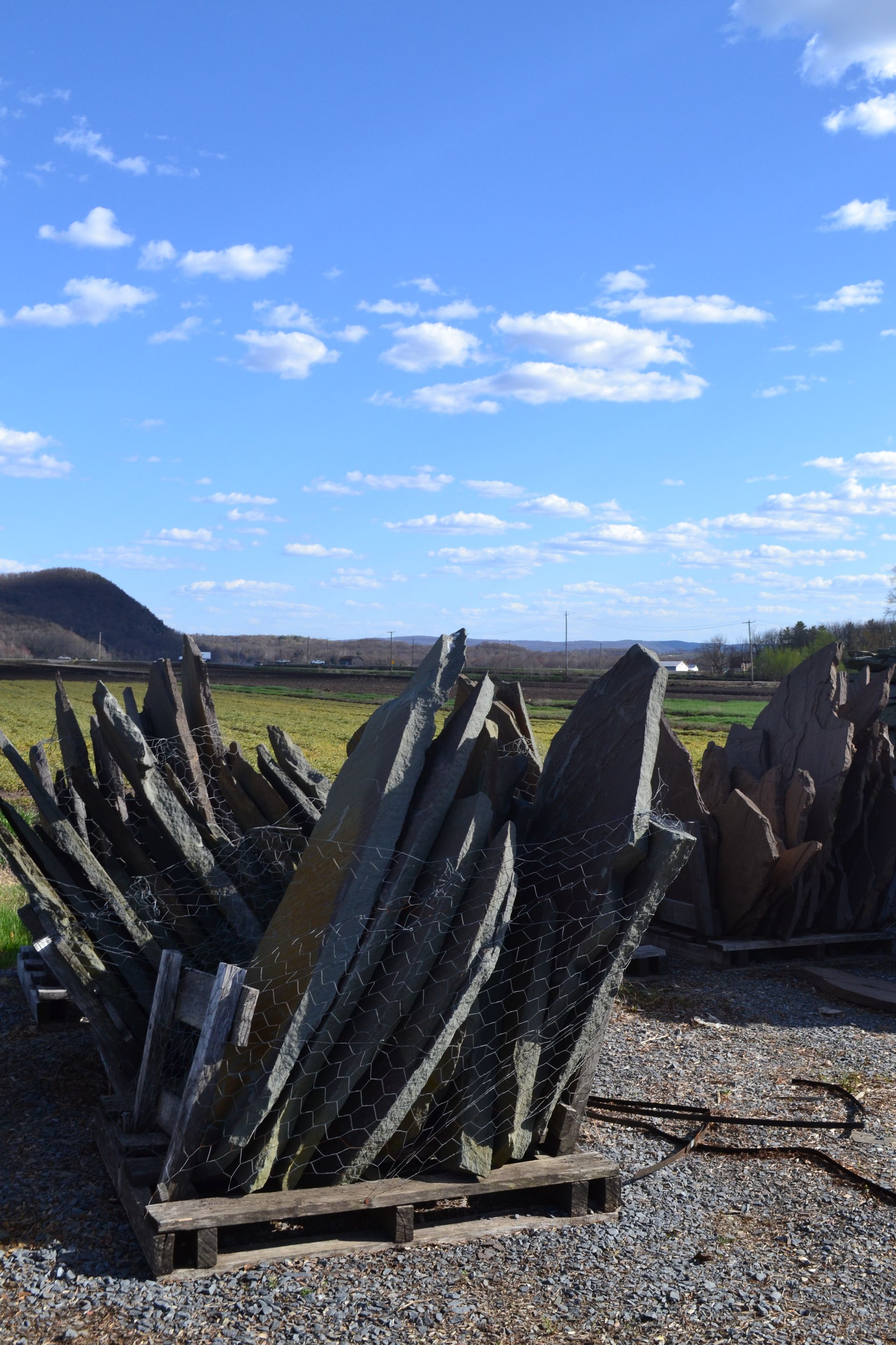 a pile of rocks sitting on top of a pile of gravel