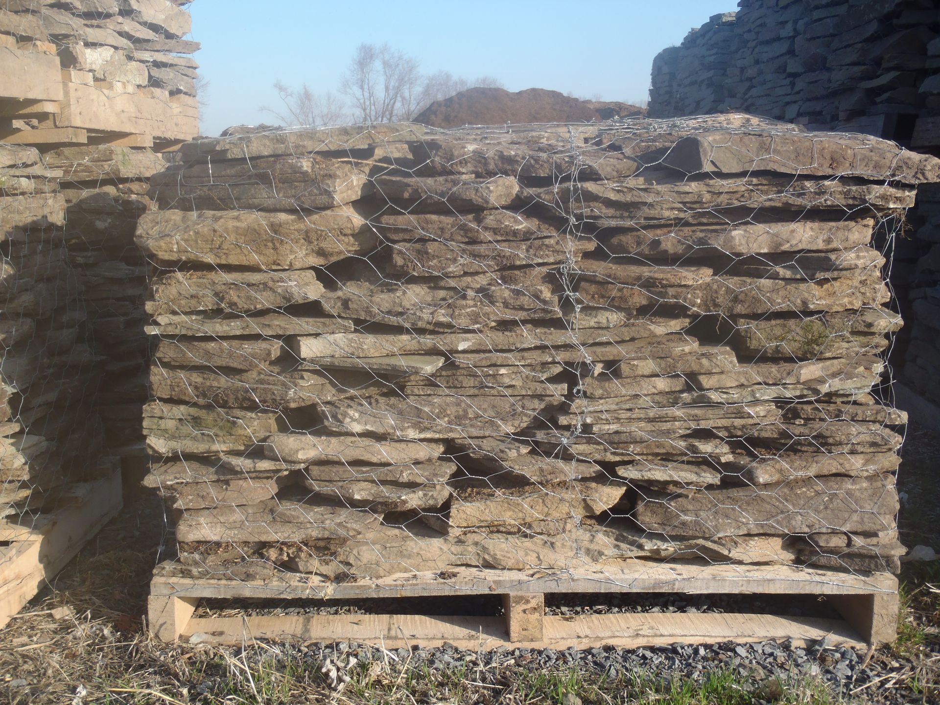 a pile of rocks is sitting on a wooden pallet