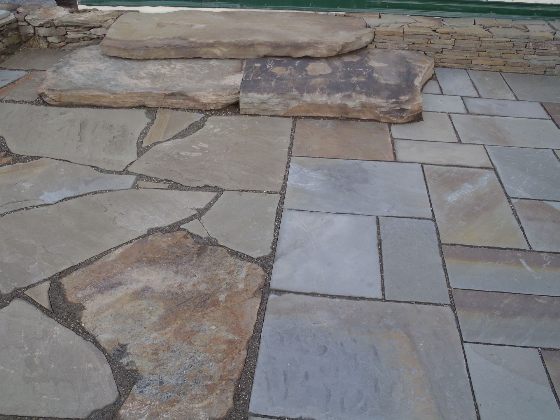 a patio with a lot of rocks on it