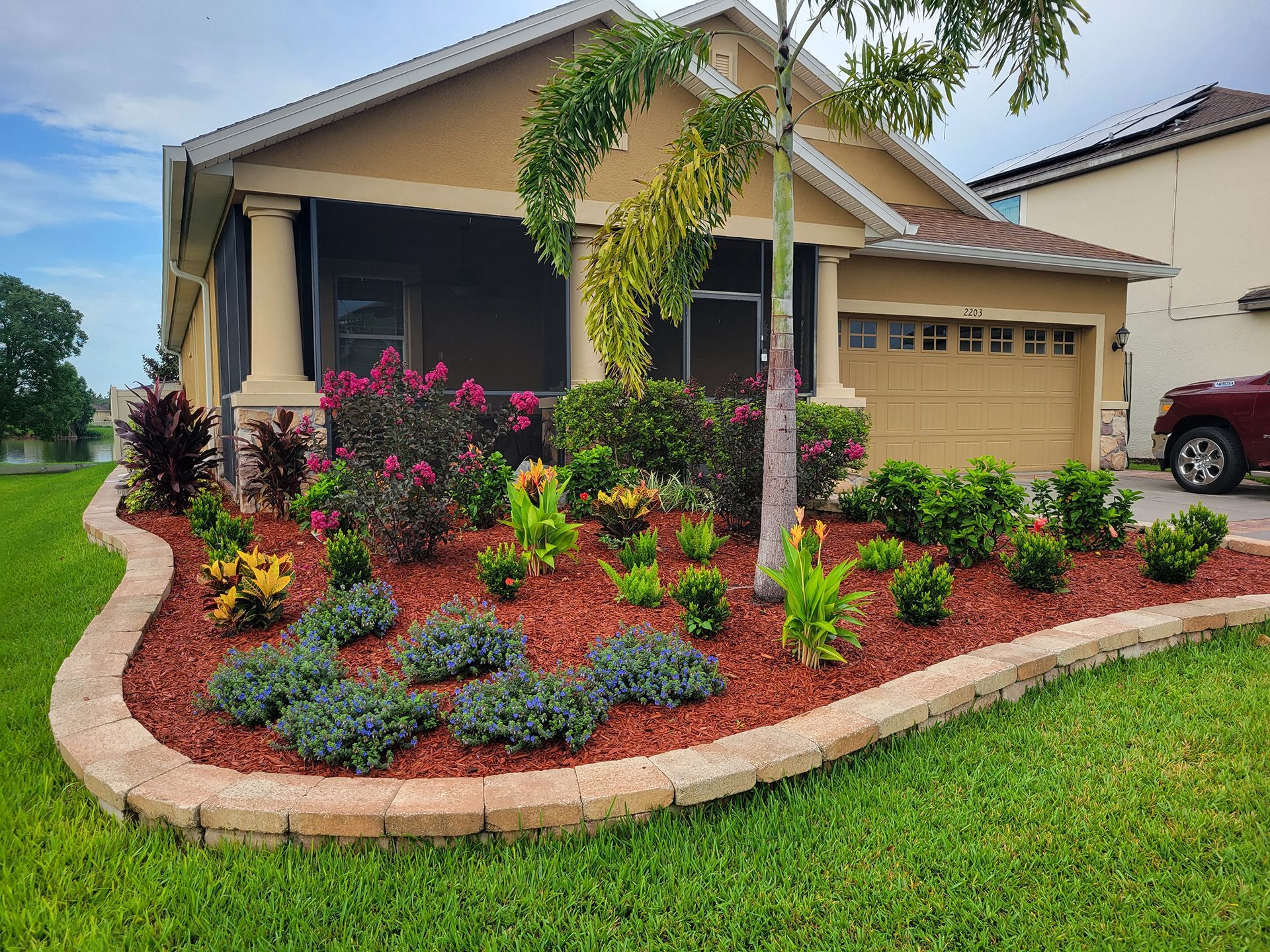 Suburban house with a brick plant bed