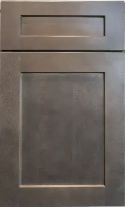A close up of a gray cabinet door on a white background.