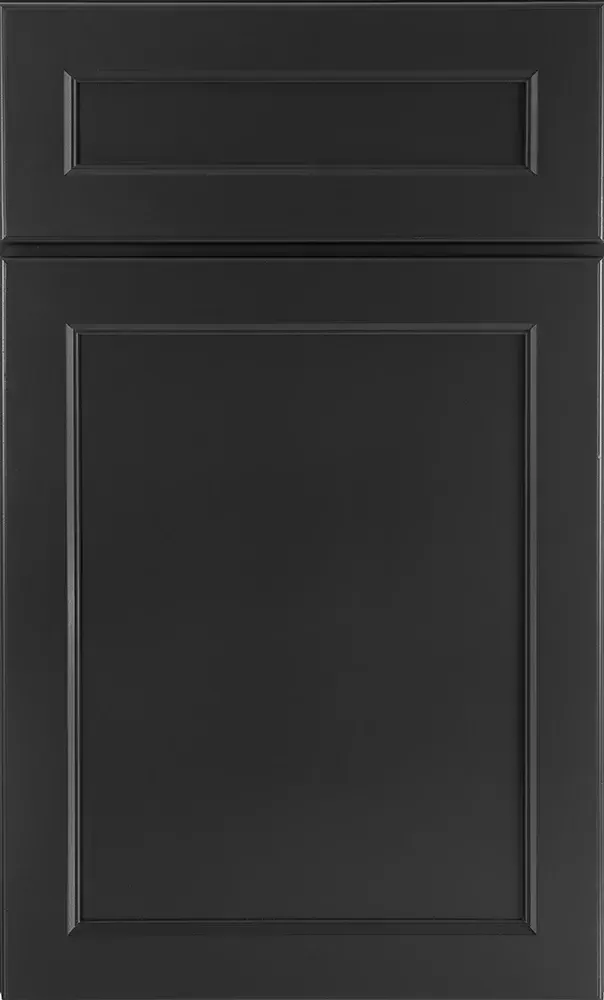 A close up of a black cabinet door on a white background.