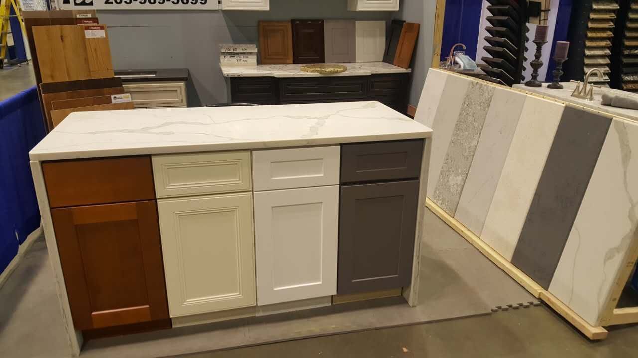 There are many different types of cabinets and counter tops on display.