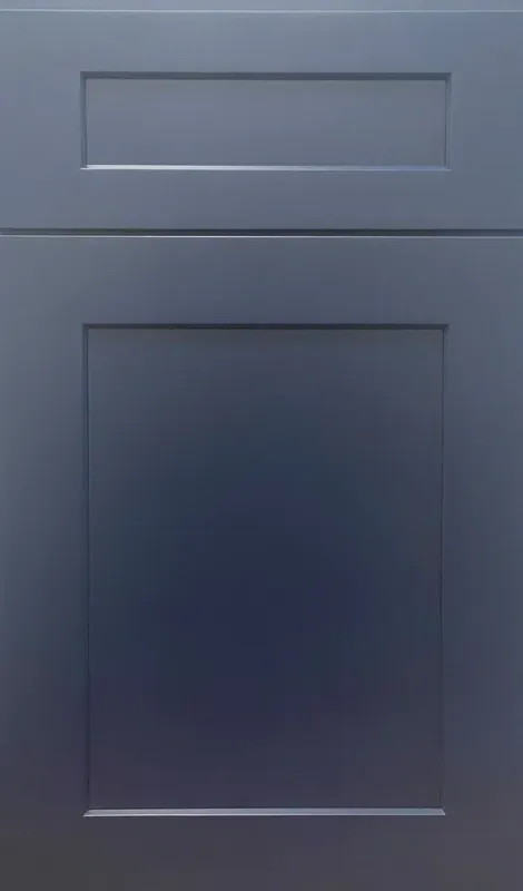 A close up of a blue cabinet door on a white background.