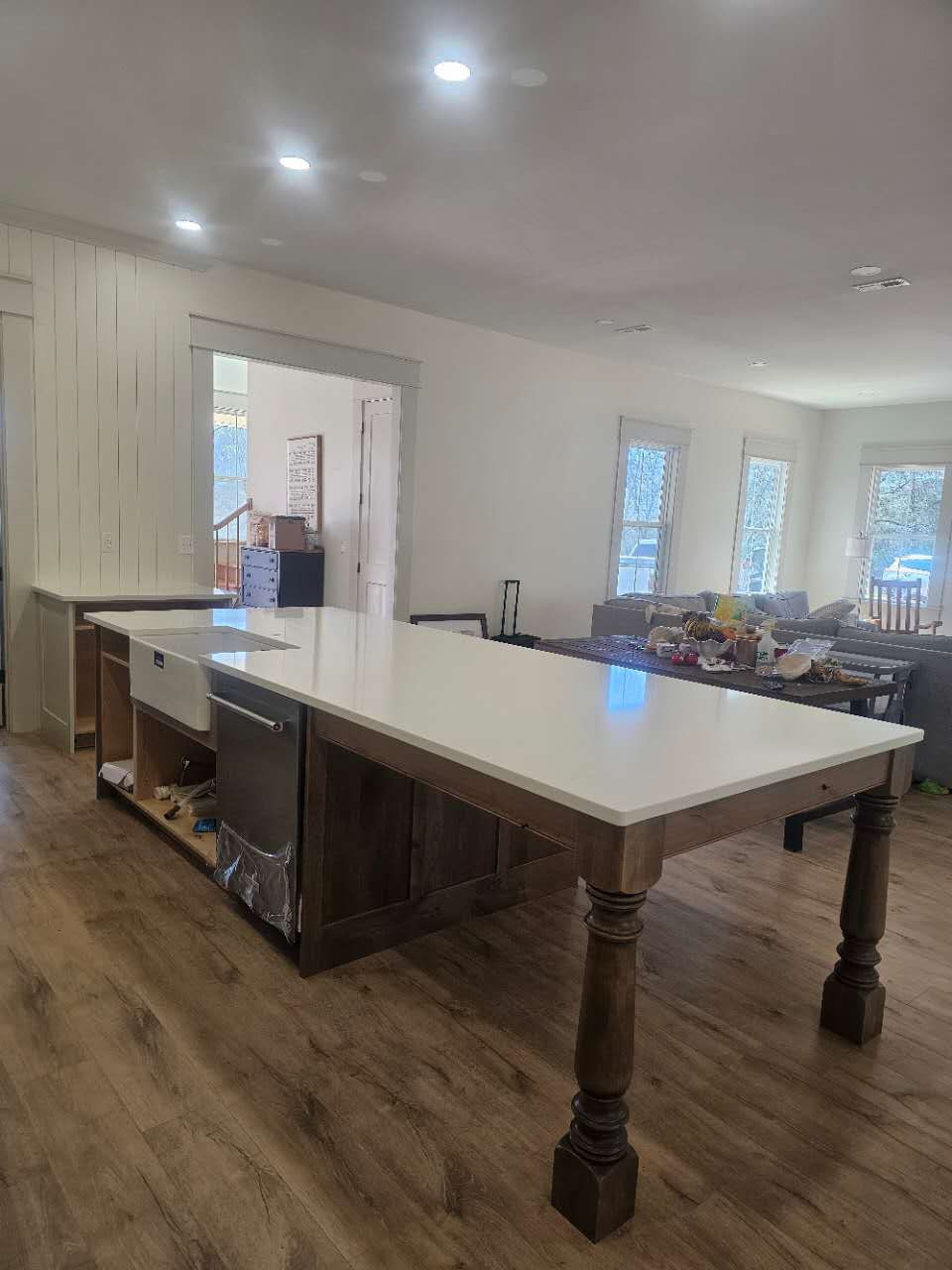 There is a large table in the middle of the room.