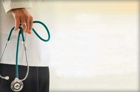 Doctor holding stethoscope