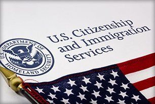 Immigration documents and US flag