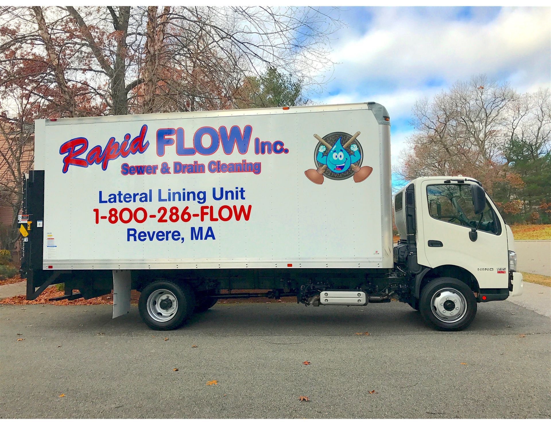 White Rapid Flow truck for sewer cleaning, with logo and contact info. Located in Revere, MA.