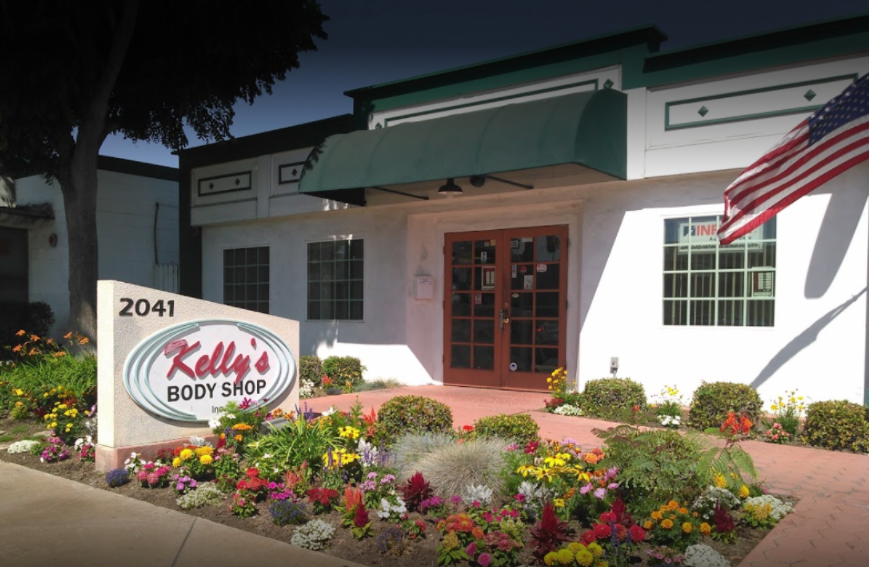 Technician performing collision repair at Kelly's Body Shop in Santa Ana