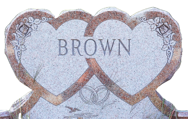 A gravestone with two hearts