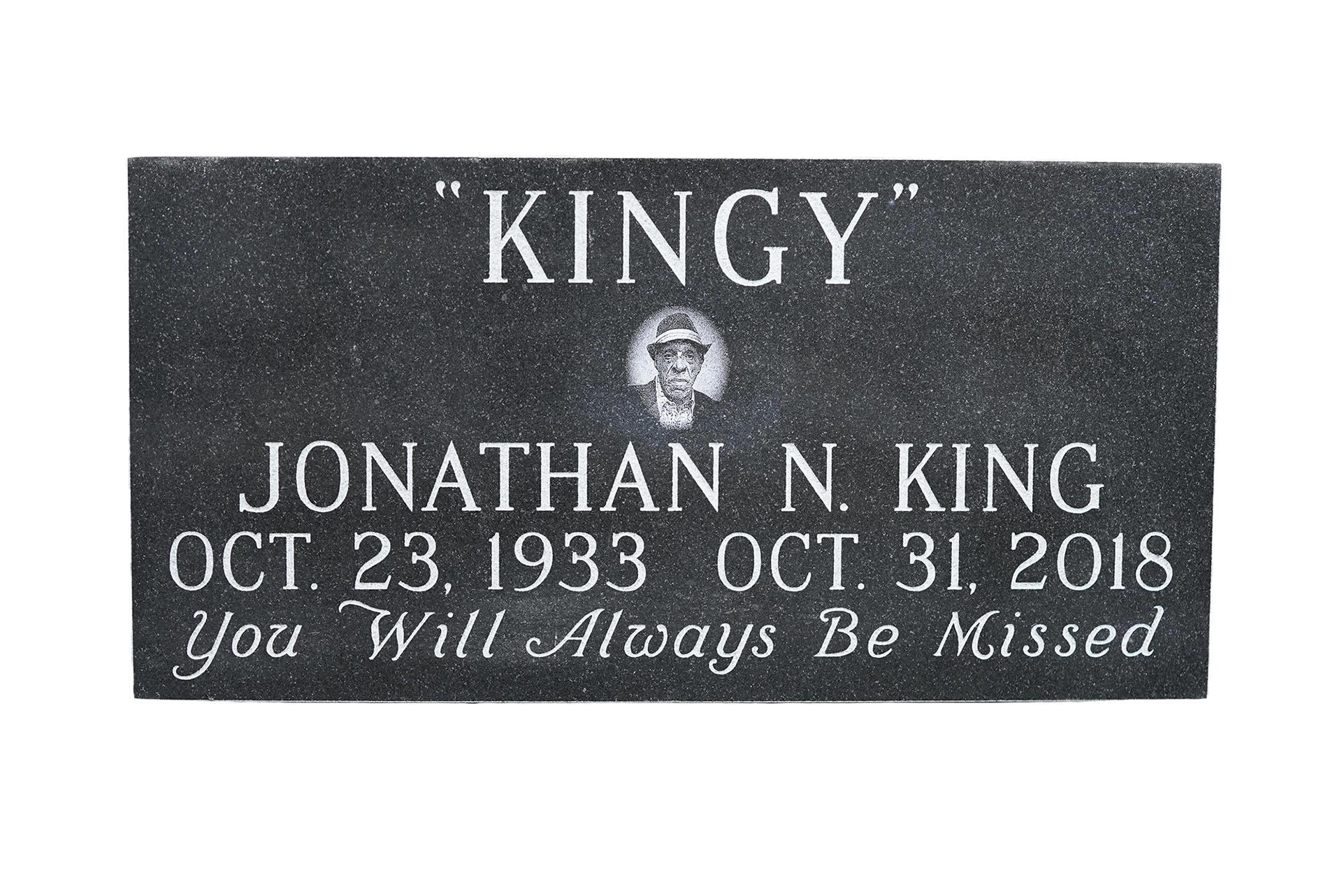 A gravestone for jonathan n. king on october 23 1933