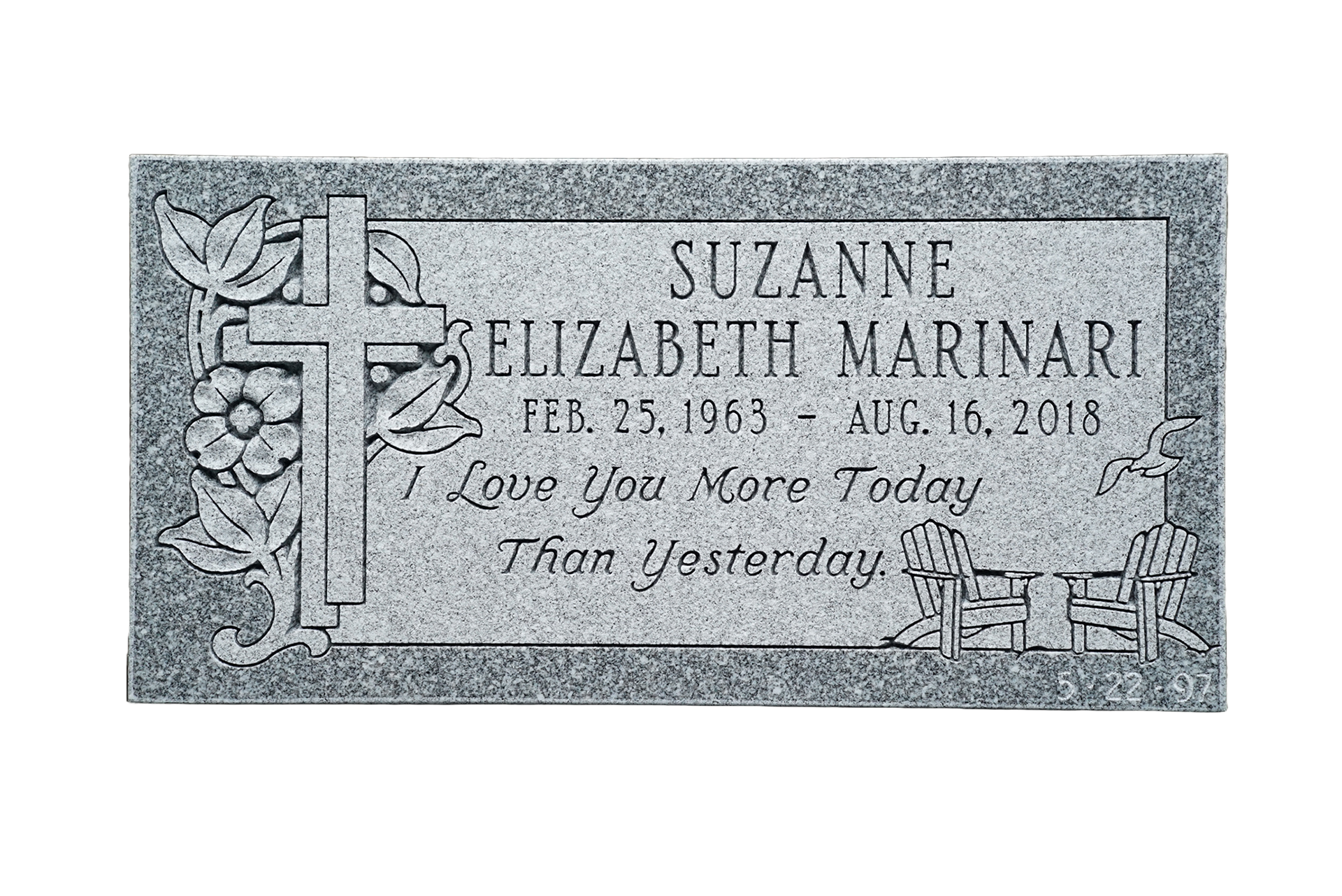 A gravestone for suzanne marinari with a cross and flowers on it.