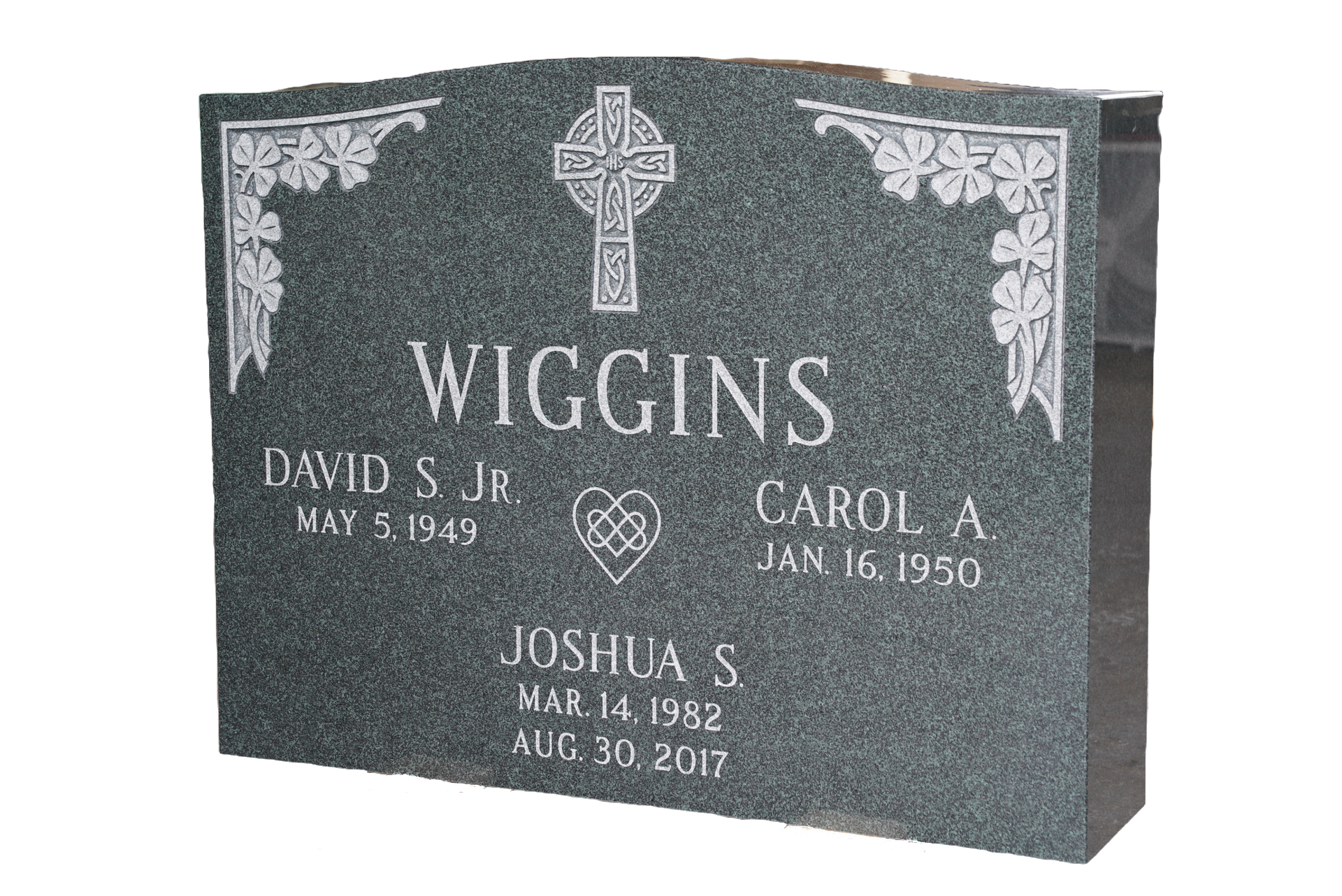 A gravestone for david and carol wiggins with a cross on it.