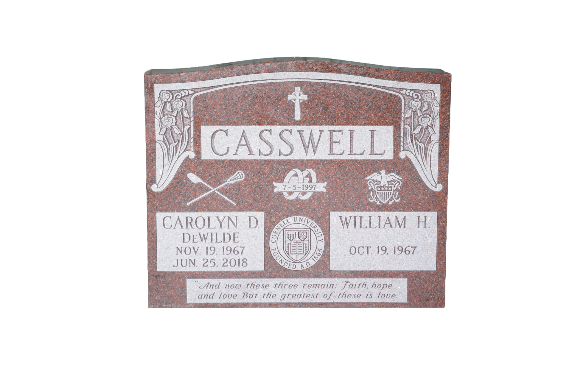 A gravestone for casswell is on a wooden stand.
