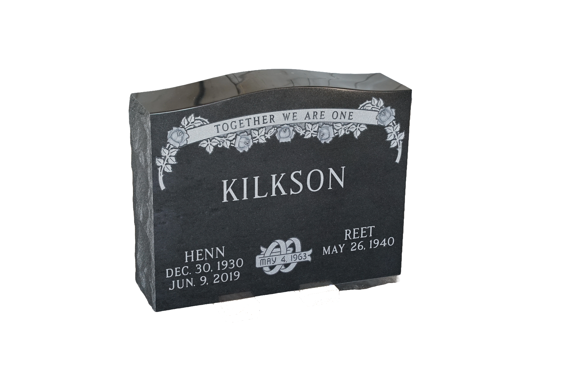 A black gravestone with the name kilkson on it