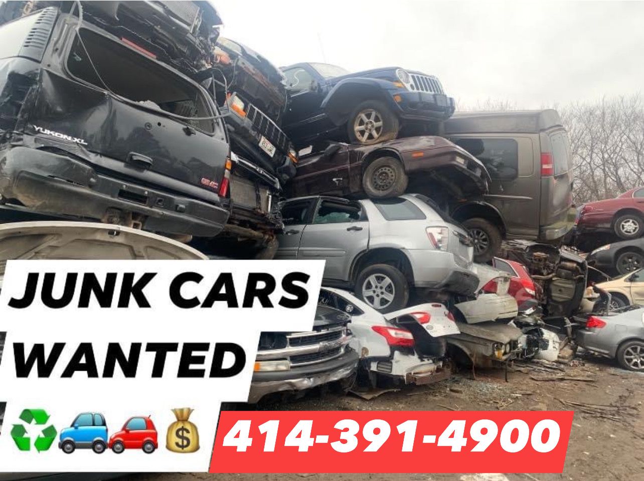 A pile of junk cars is stacked on top of each other.