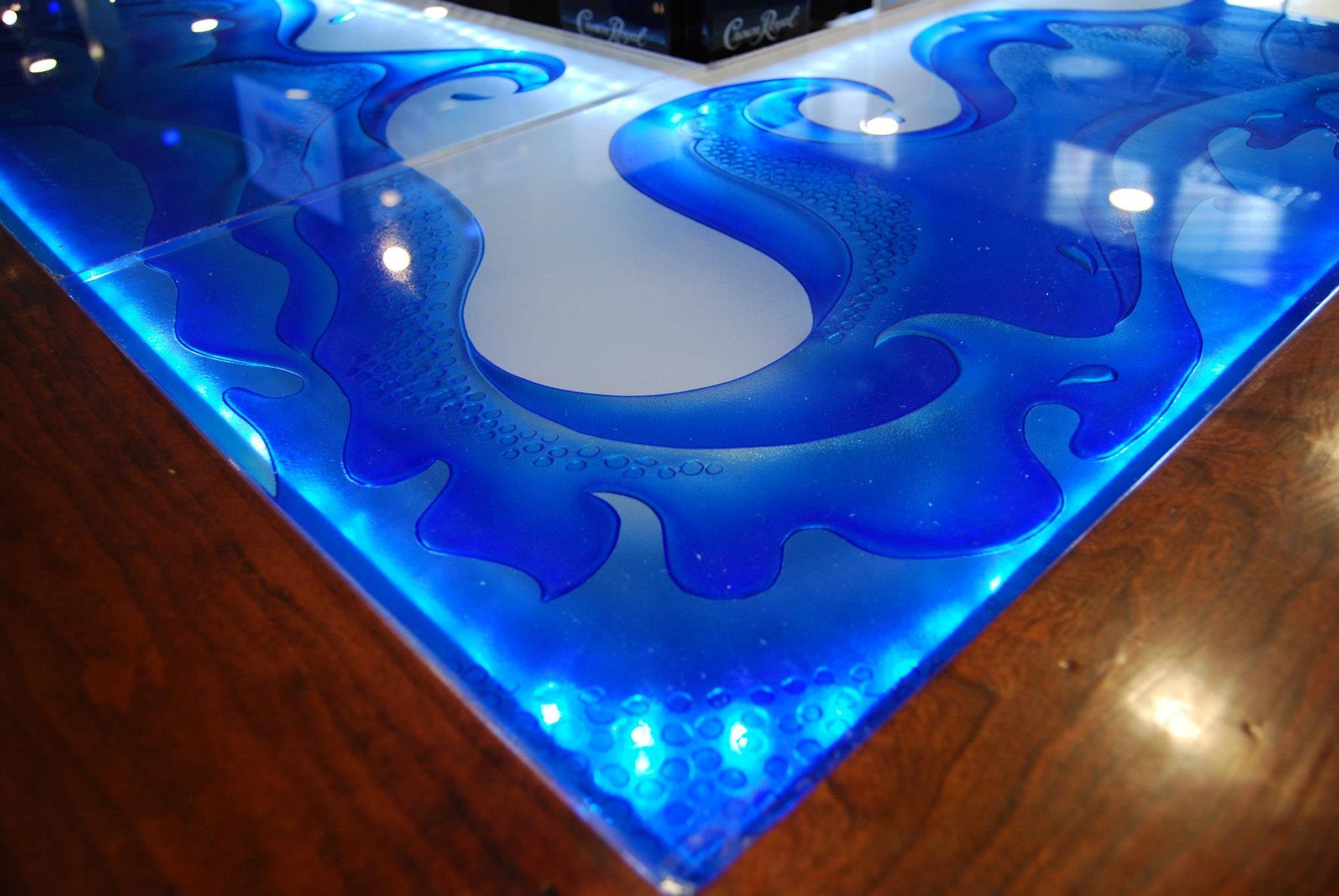 A blue and white floor with a swirl design on it.