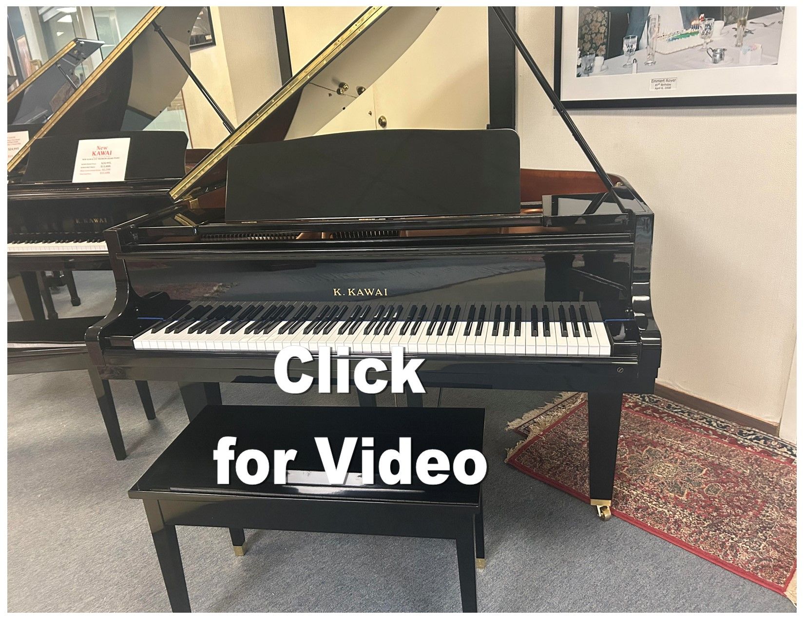 Black Kawai grand piano with bench; 