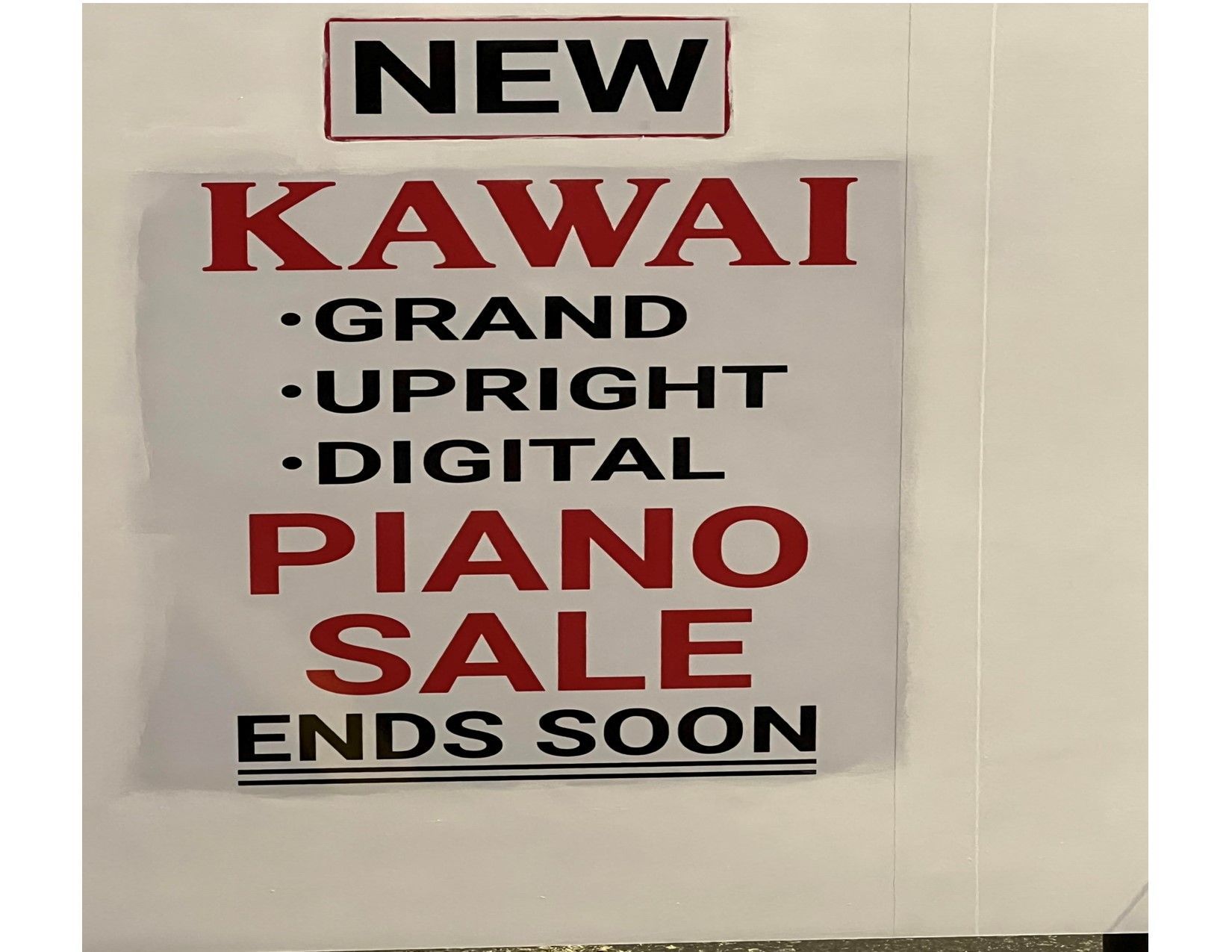 Sale advertisement for Kawai pianos: grand, upright, and digital models. Christmas-themed border.