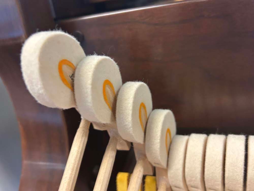 A close up of the keys of a piano