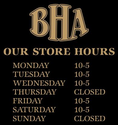 A sign that says our store hours on it