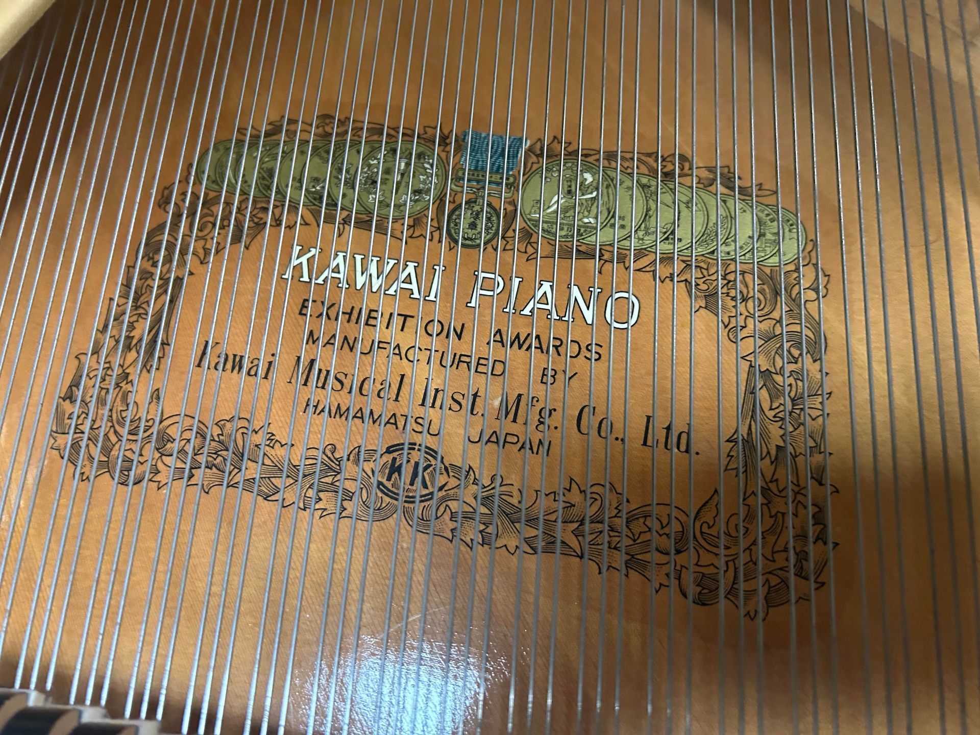 Inside a piano, a label reading
