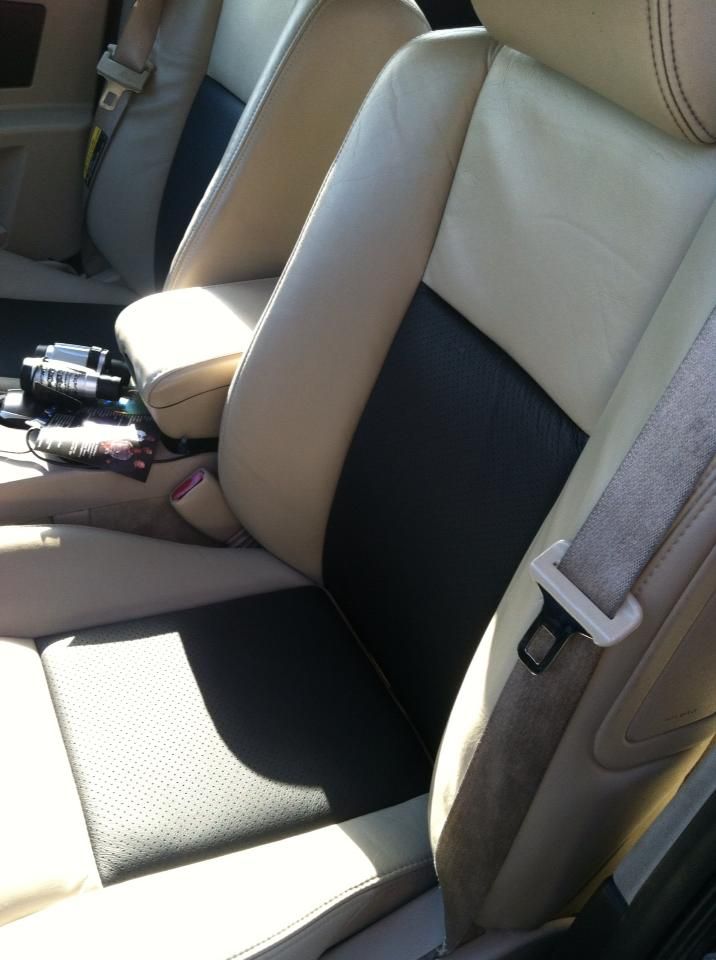 A car seat with a seat belt on it