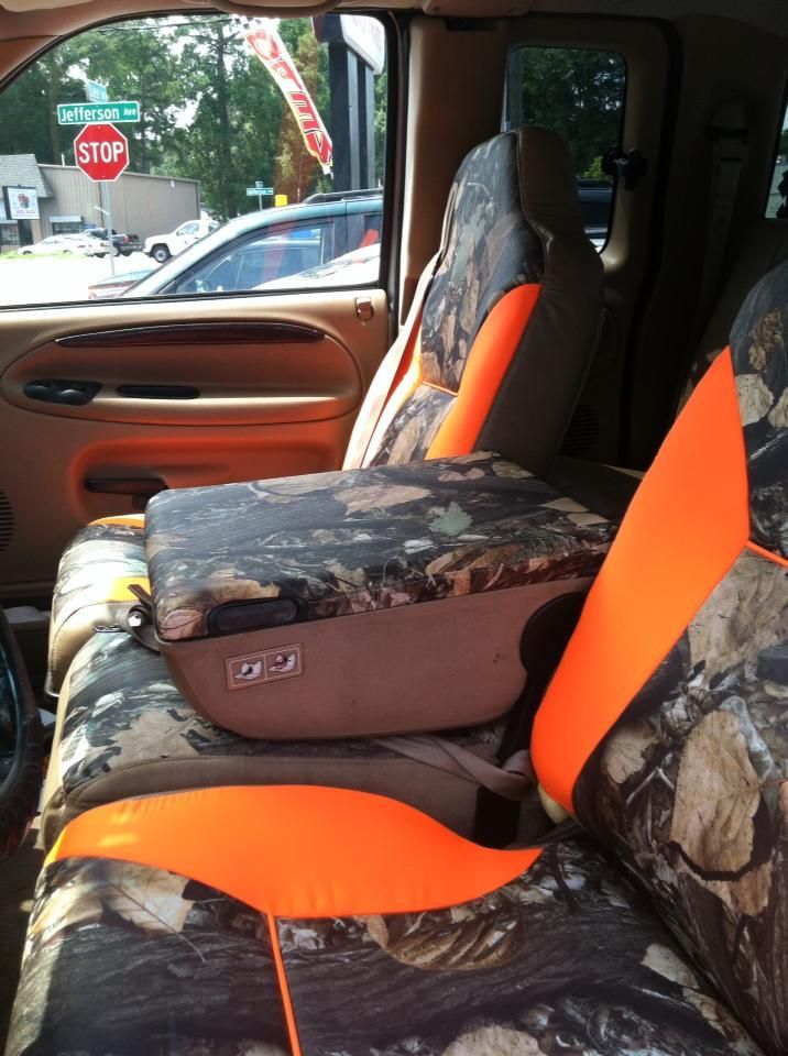 A car with a stop sign in the background