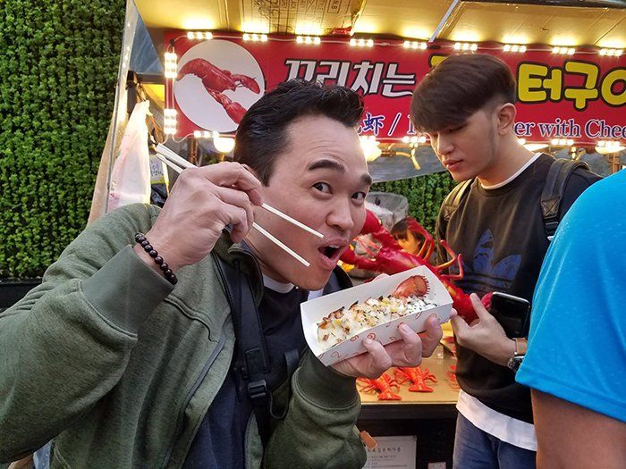Man eating Korean food
