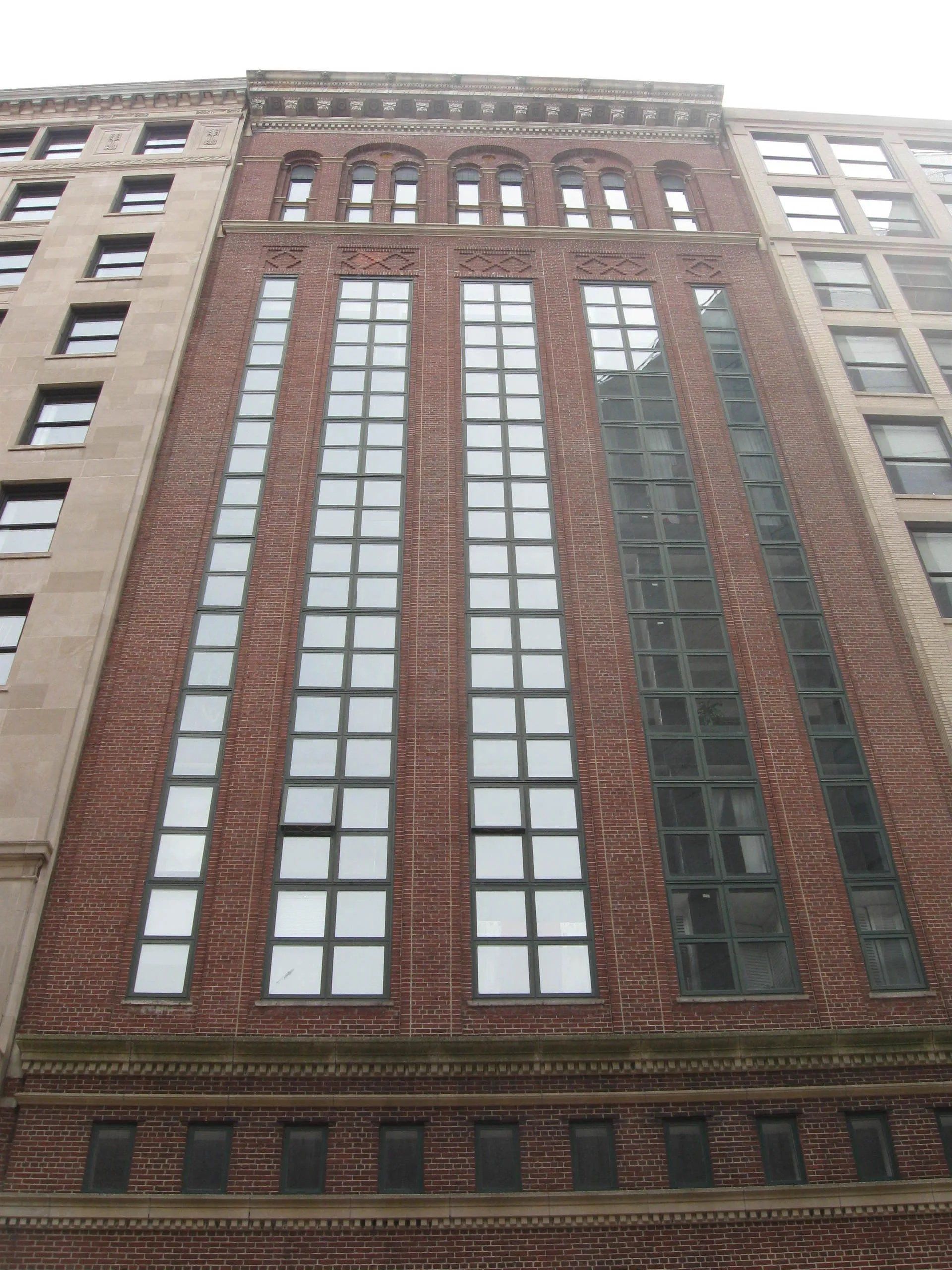 Building with structural brick wall