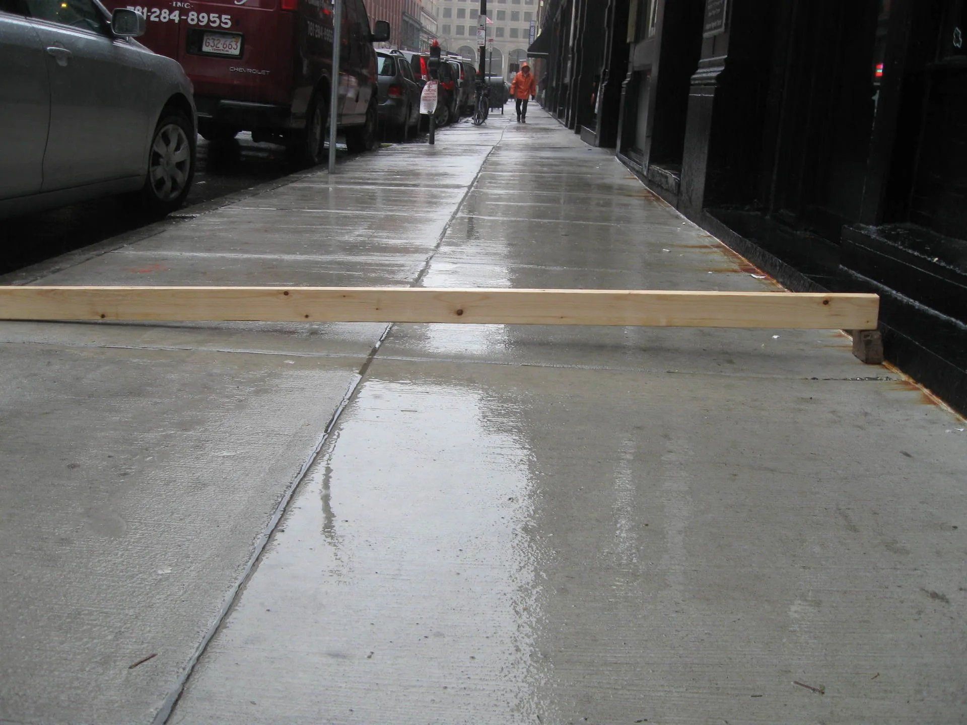 New concrete sidewalk on a commercial building