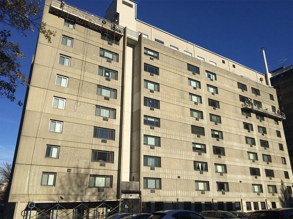 Commercial building with new backing rod and sealant