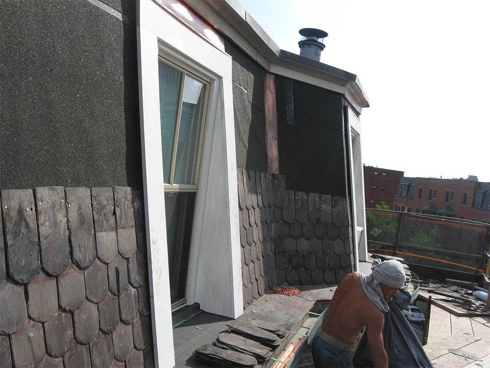 Mansard slate roof replacement and re-pointing work
