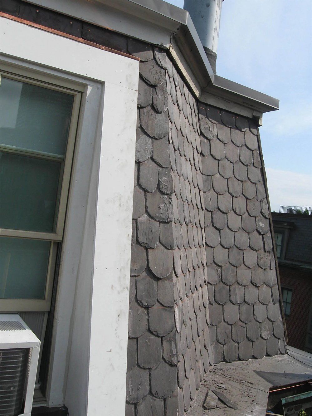 Mansard slate roof replacement and re-pointing work