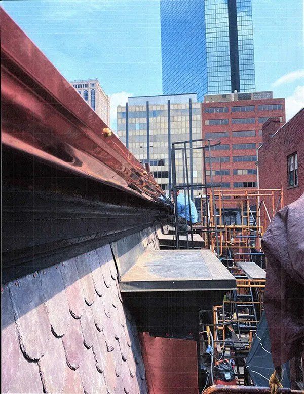 Exterior masonry repairs and mansard roof replacement